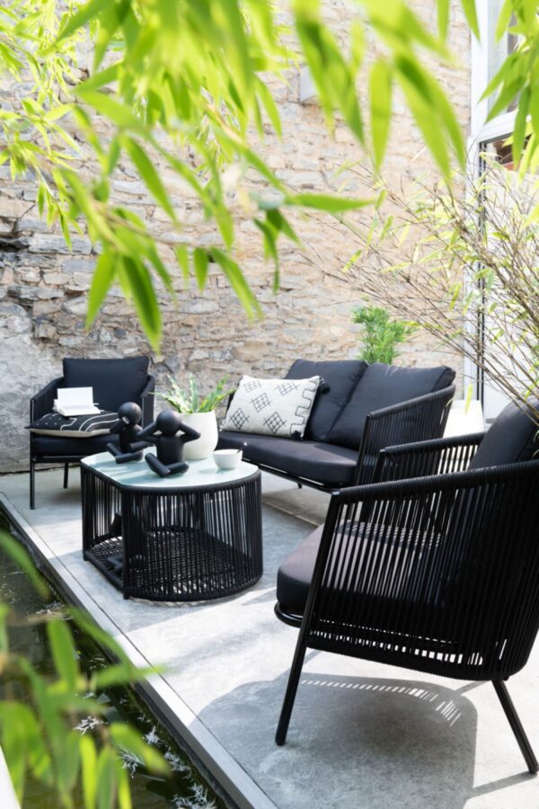 coussin rectangulaire en coton avec graphiques beige et noir salon de jardin canapés et fauteuils en rotin tressé noir