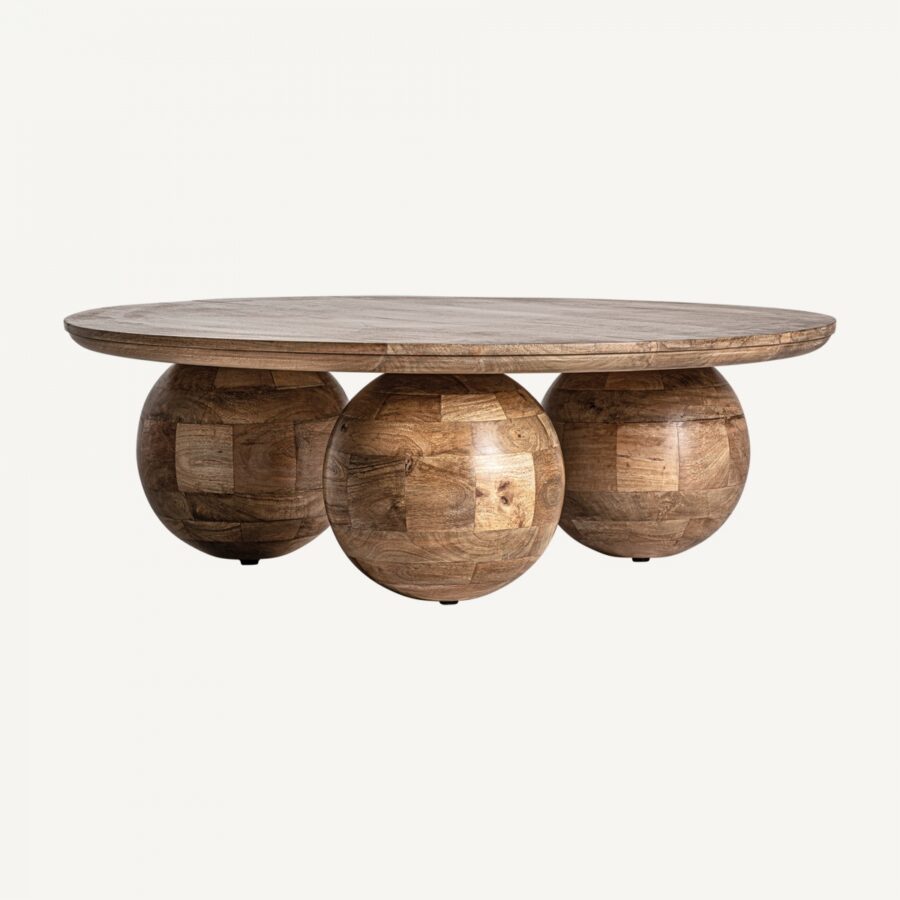 Table basse ronde avec trois pieds boules en bois massif de manguier de chez Vical