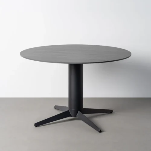 Table à manger ronde plateau céramique effet travertin noir Ixia 120 cm